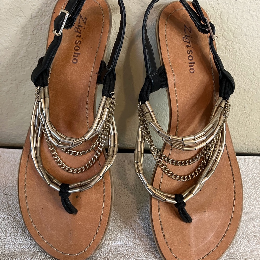 Zigisoho cute sandals with gold straps and chains. Heel strap and buckle.